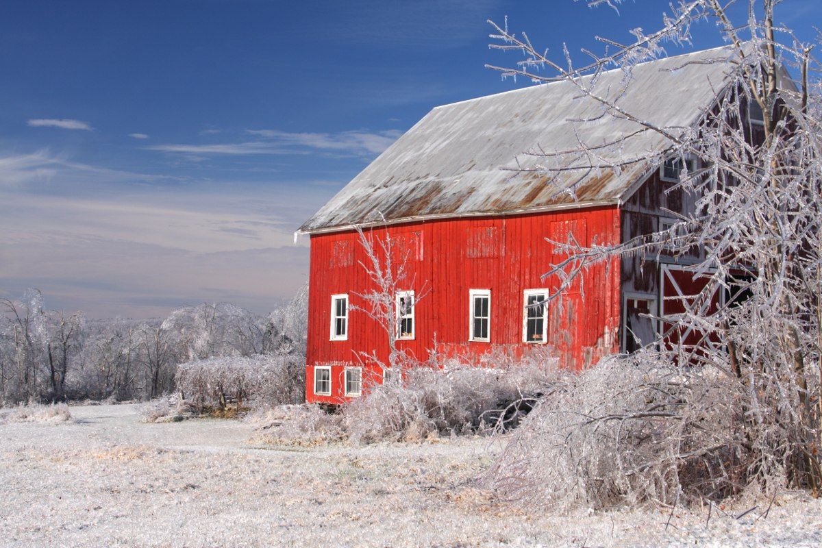 A snow-covered barn featured as a Massachusetts filming location by the Massachusetts Film Office; location context, not the office itself.