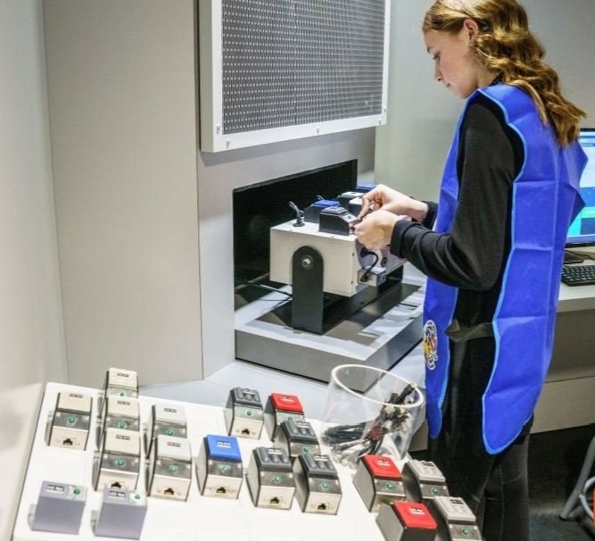 A participant using mission-simulation equipment at Framingham State’s Christa McAuliffe Center.