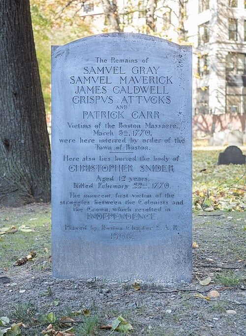 Memorial stone for the Boston Massacre victims, including Crispus Attucks, in Boston’s Granary Burying Ground.